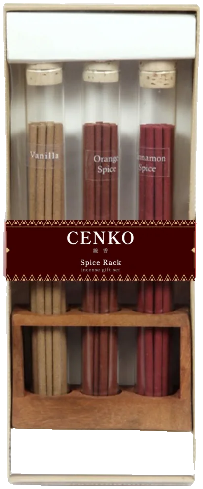 The Spice Rack gift set: three corked glass vials of incense standing in a wooden rack